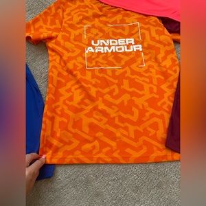 Boys Youth Large UA tees. The first orange one is youth XL.